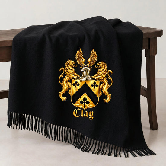 Black wool blanket draped over a chair with the official gold and black Lion&