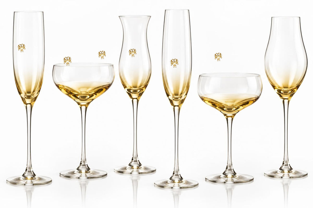 Crystal champagne glasses with gold-to-clear fade and centered official Lion&
