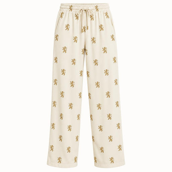Relaxed lounge pants with repeating gold Lion&