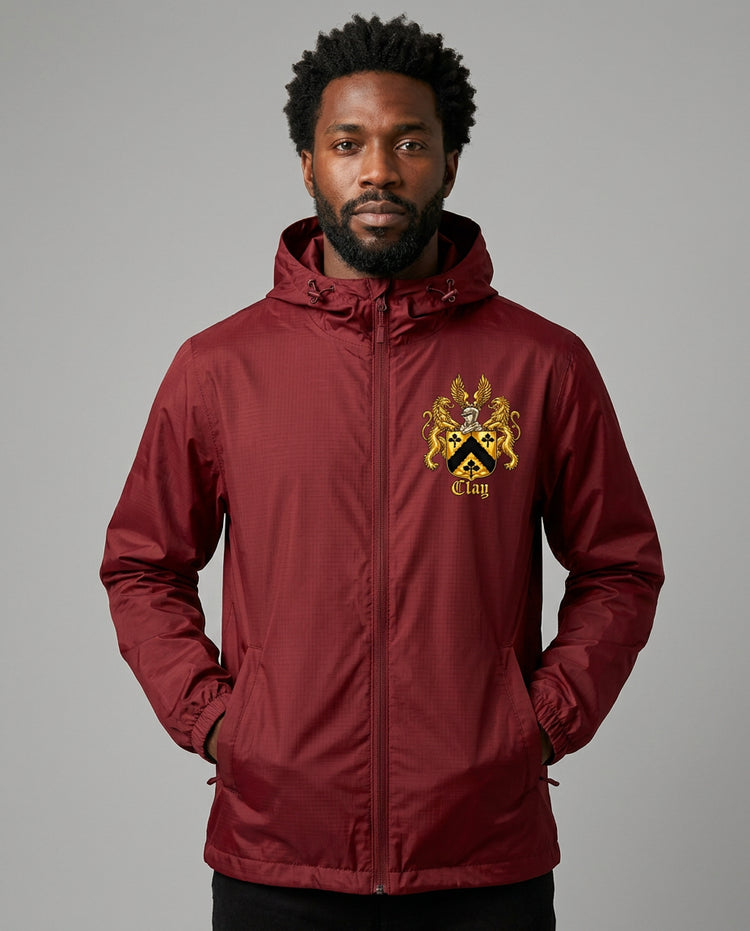 Oxblood packable waterproof hooded rain jacket with the official gold Lion&