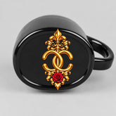 Bottom of the oval mug with the gold rose CC crest