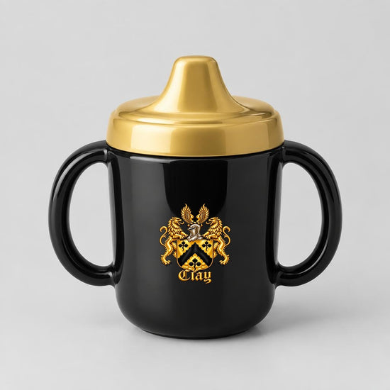 Black sippy cup with gold lid and the gold lion crest