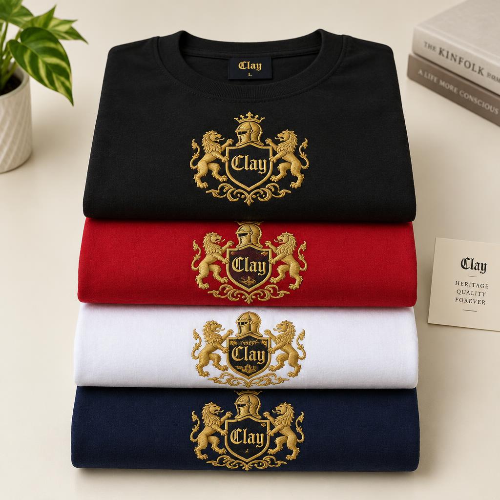 Folded Clay crest organic cotton tees